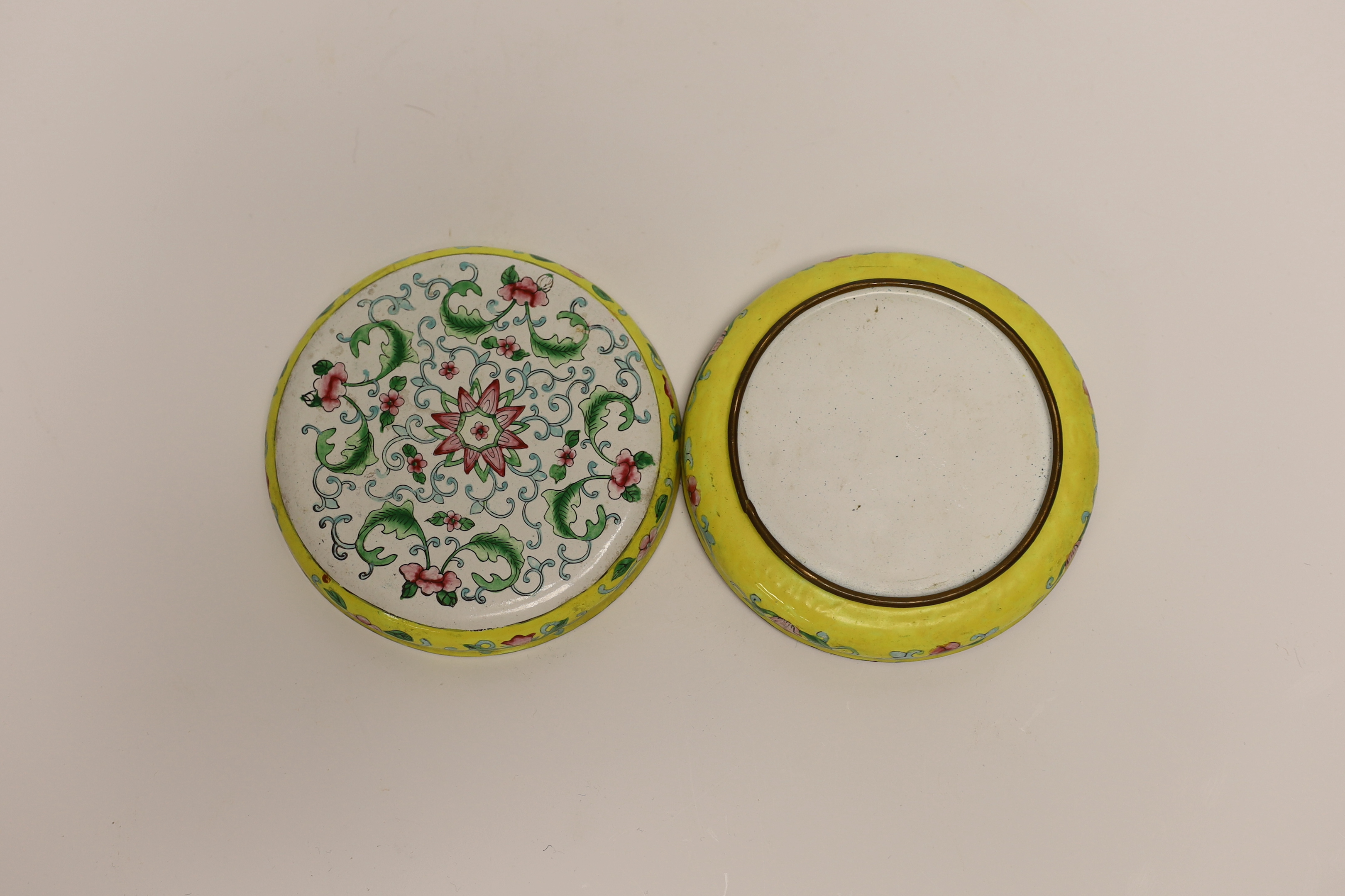 A Chinese Canton enamel circular box and cover, 13cm diameter